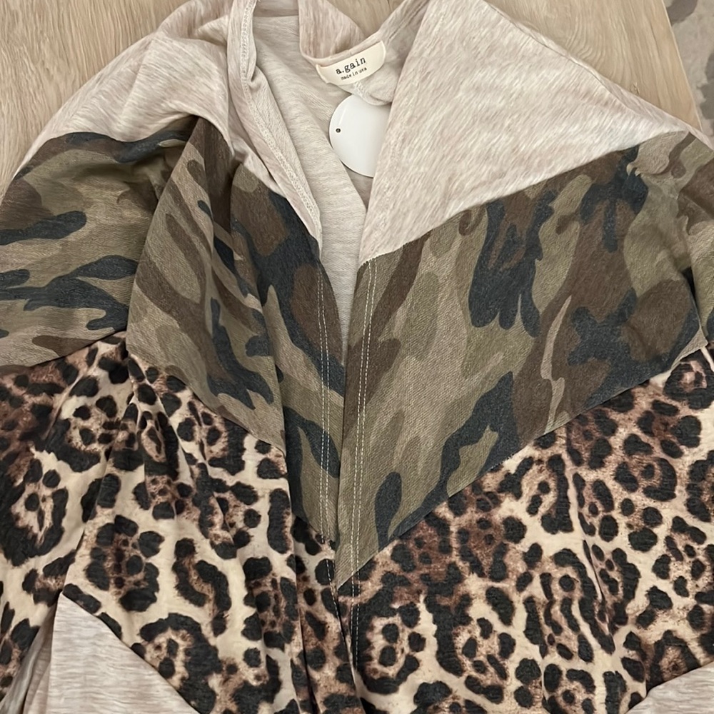Light sweater brand new with tags